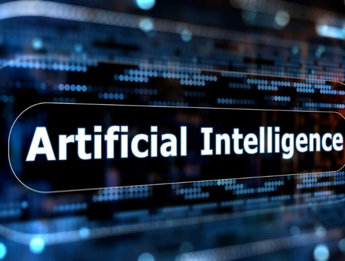 The term “artificial intelligence” depicted on a digital background, representing AI and machine learning.