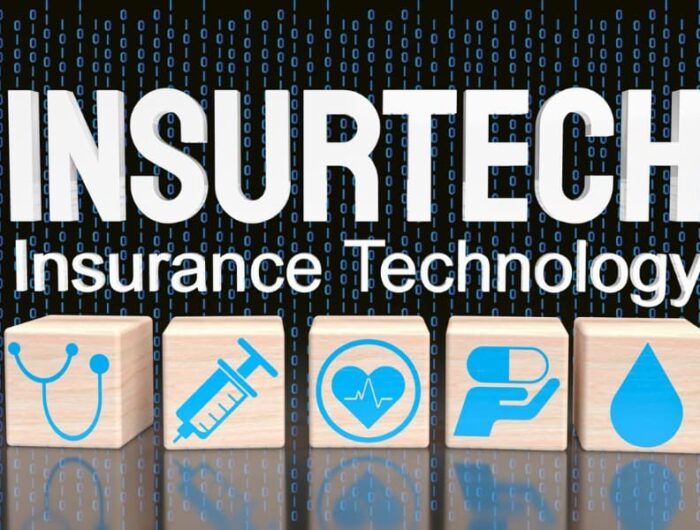 The word InsurTech on a technology background